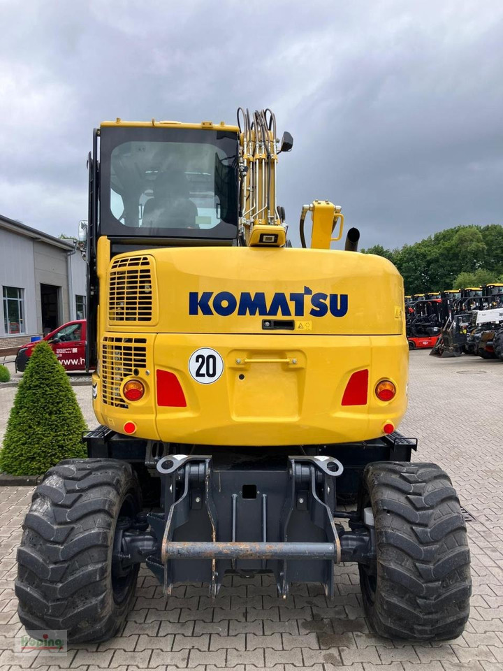 Komatsu PW98 MR - Gumikerekes kotró: 4 kép. Komatsu PW98 MR - Gumikerekes kotró: 4 kép.
