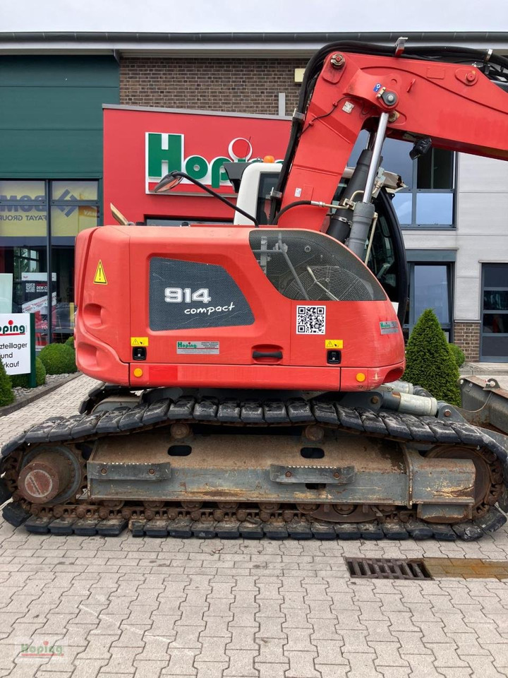 Liebherr R914 Compact - Lánctalpas kotró: 4 kép. Liebherr R914 Compact - Lánctalpas kotró: 4 kép.