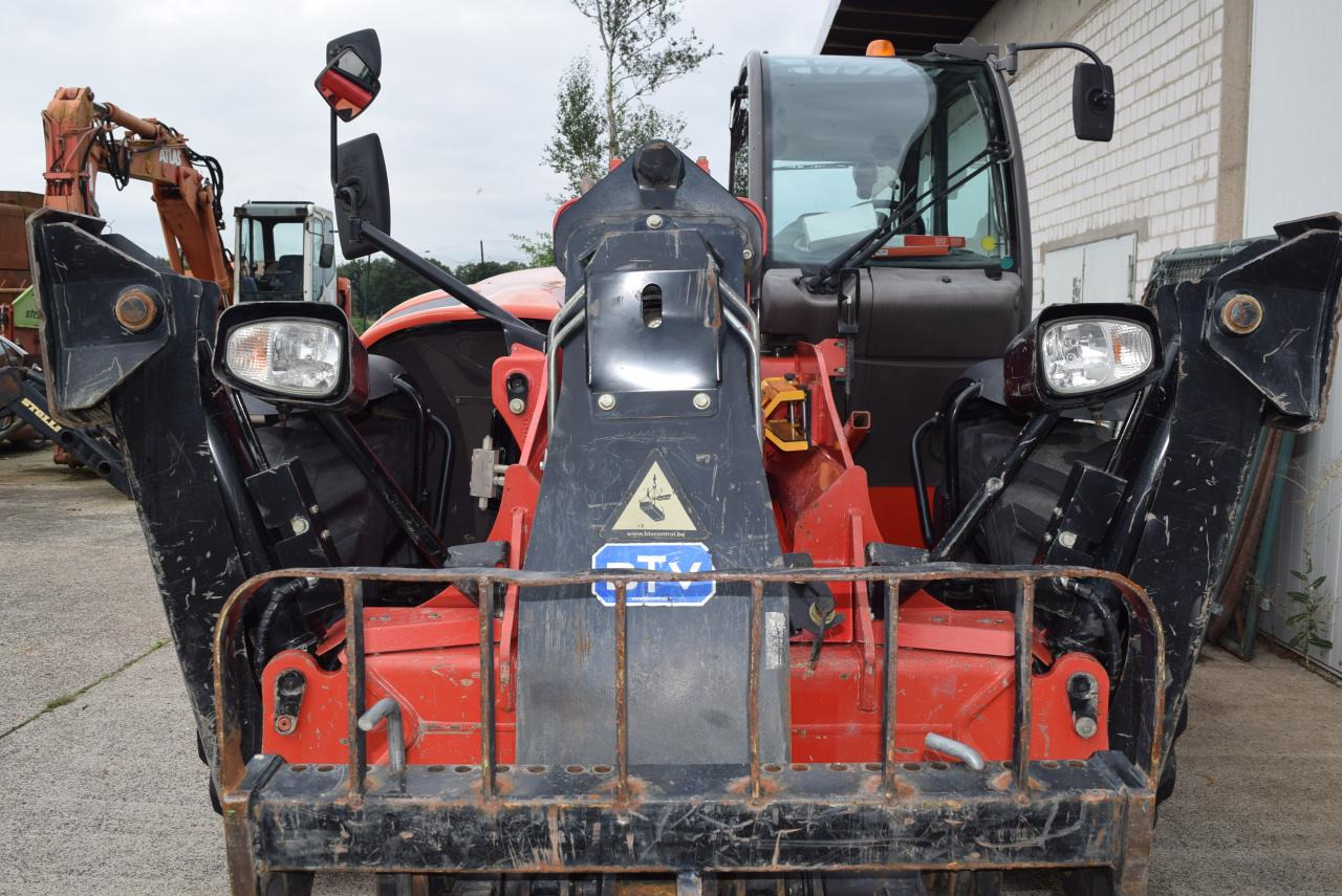 Manitou MT1440 - Teleszkópos rakodó: 4 kép. Manitou MT1440 - Teleszkópos rakodó: 4 kép.