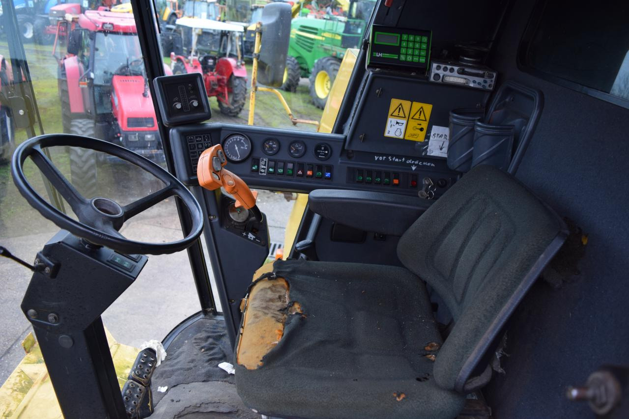 Kombájn New Holland TC 56: 8 kép.