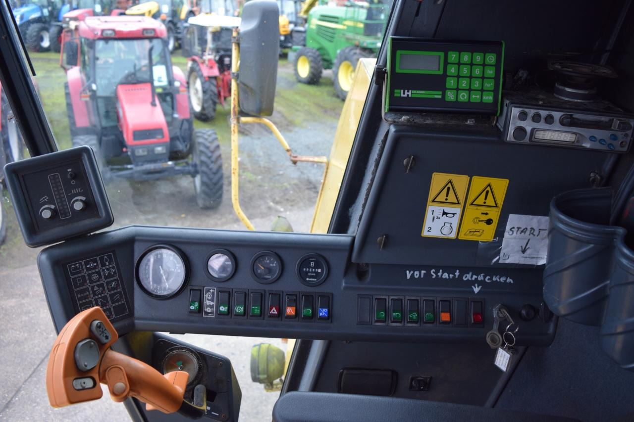 Kombájn New Holland TC 56: 10 kép.