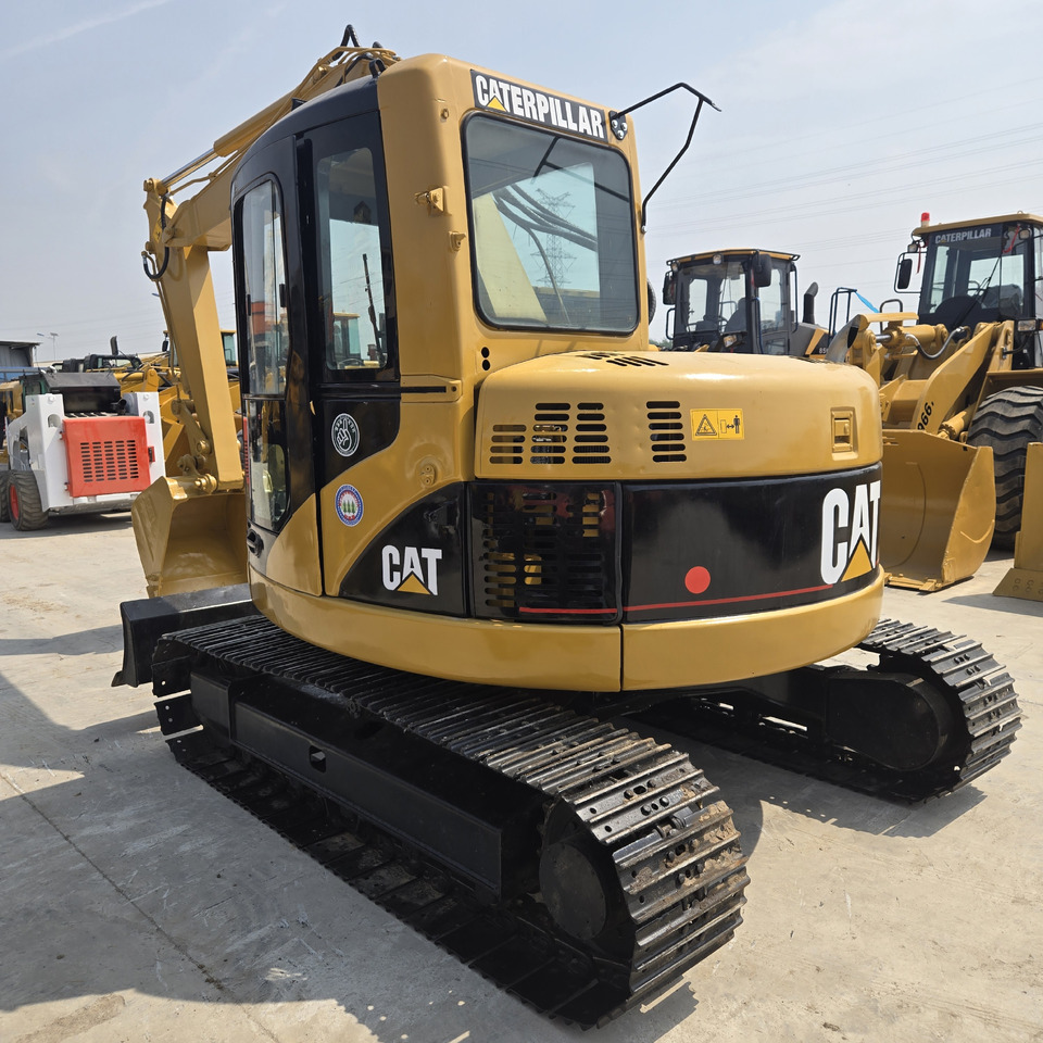 CATERPILLAR 308C CR - Minikotró: 2 kép. CATERPILLAR 308C CR - Minikotró: 2 kép.