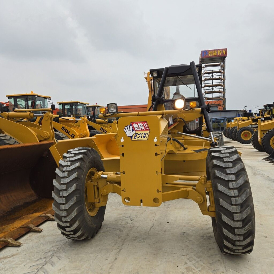 Gréder Caterpillar 140H: 10 kép.