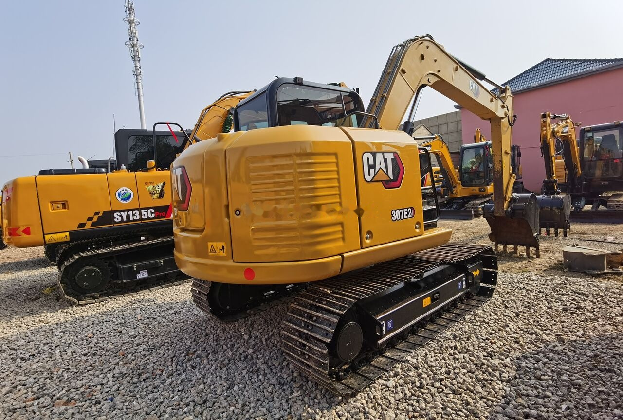 Caterpillar 307E2 - Minikotró: 4 kép. Caterpillar 307E2 - Minikotró: 4 kép.