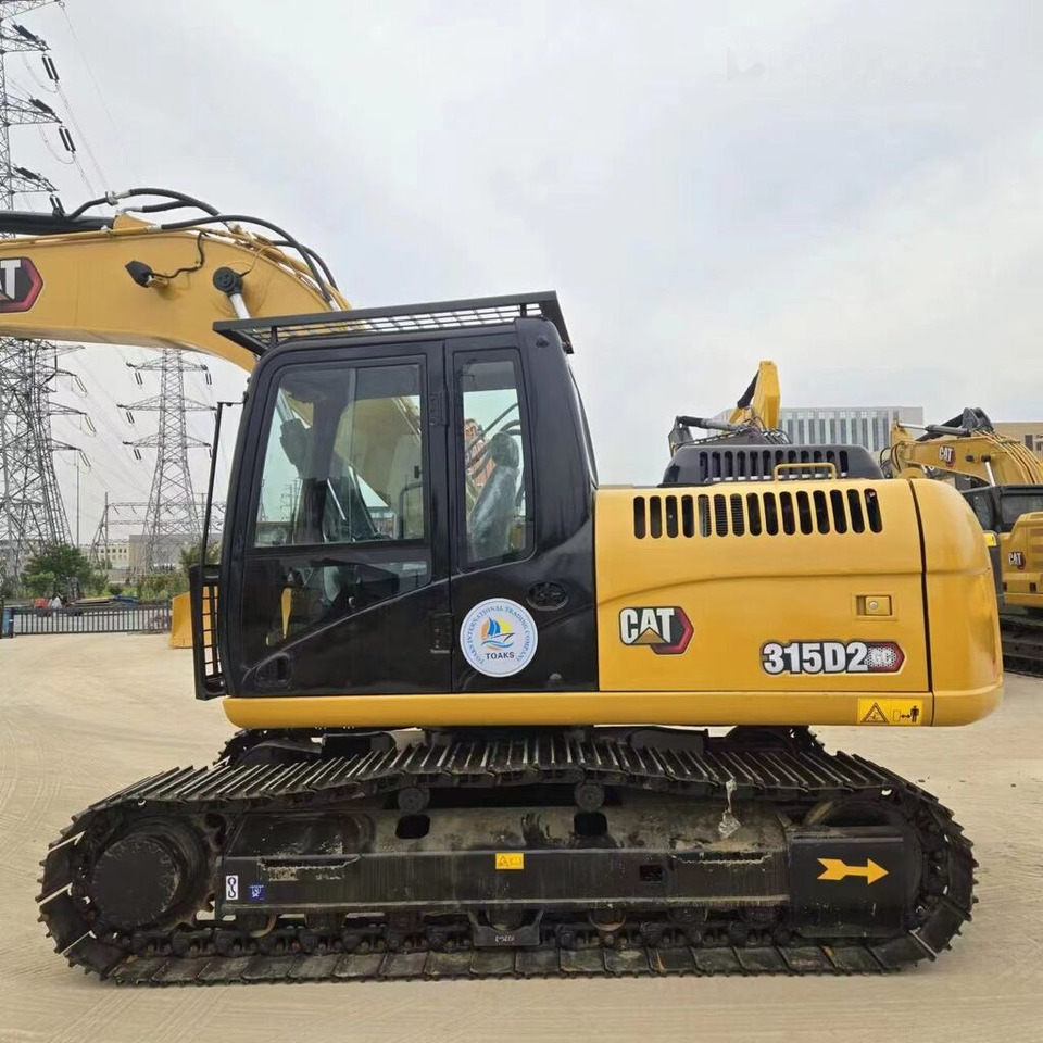 Caterpillar 315D2GC - Lánctalpas kotró: 1 kép. Caterpillar 315D2GC - Lánctalpas kotró: 1 kép.