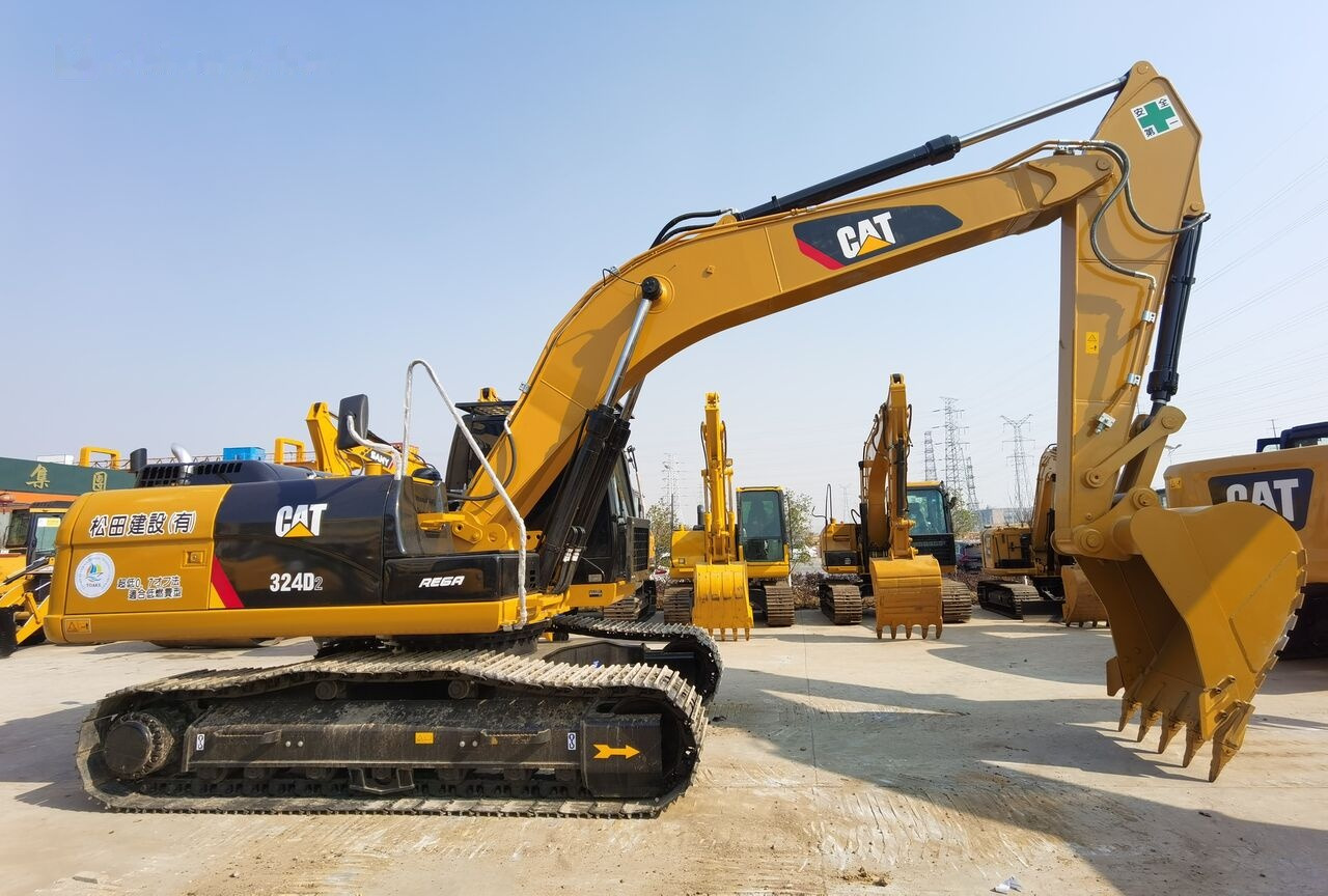 Caterpillar 324D2 - Lánctalpas kotró: 1 kép. Caterpillar 324D2 - Lánctalpas kotró: 1 kép.