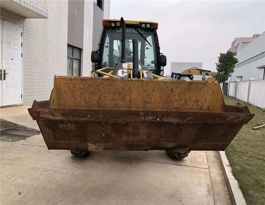 Caterpillar 416E - Kotrórakodó: 5 kép. Caterpillar 416E - Kotrórakodó: 5 kép.