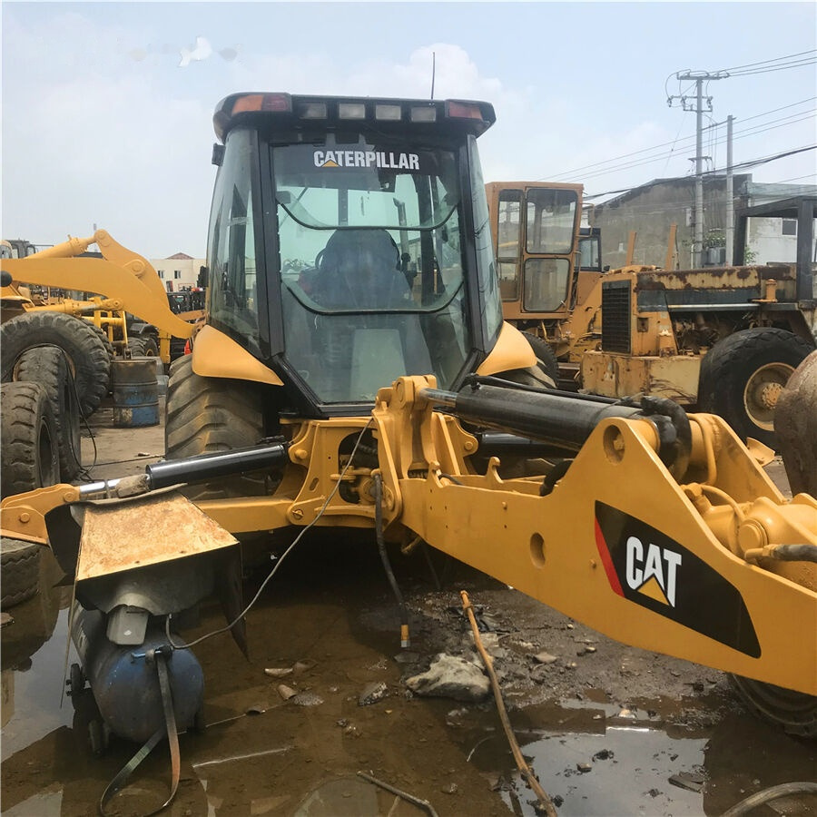 Caterpillar 430F - Kotrórakodó: 4 kép. Caterpillar 430F - Kotrórakodó: 4 kép.
