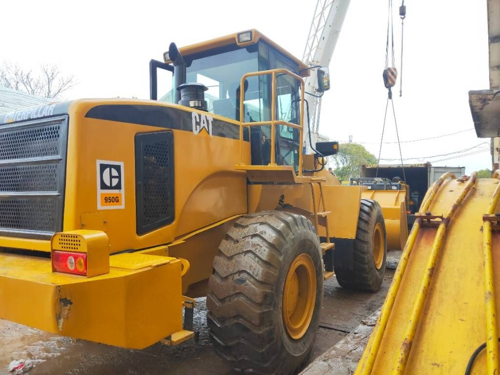 Caterpillar 950 G - Gumikerekes homlokrakodó: 4 kép. Caterpillar 950 G - Gumikerekes homlokrakodó: 4 kép.