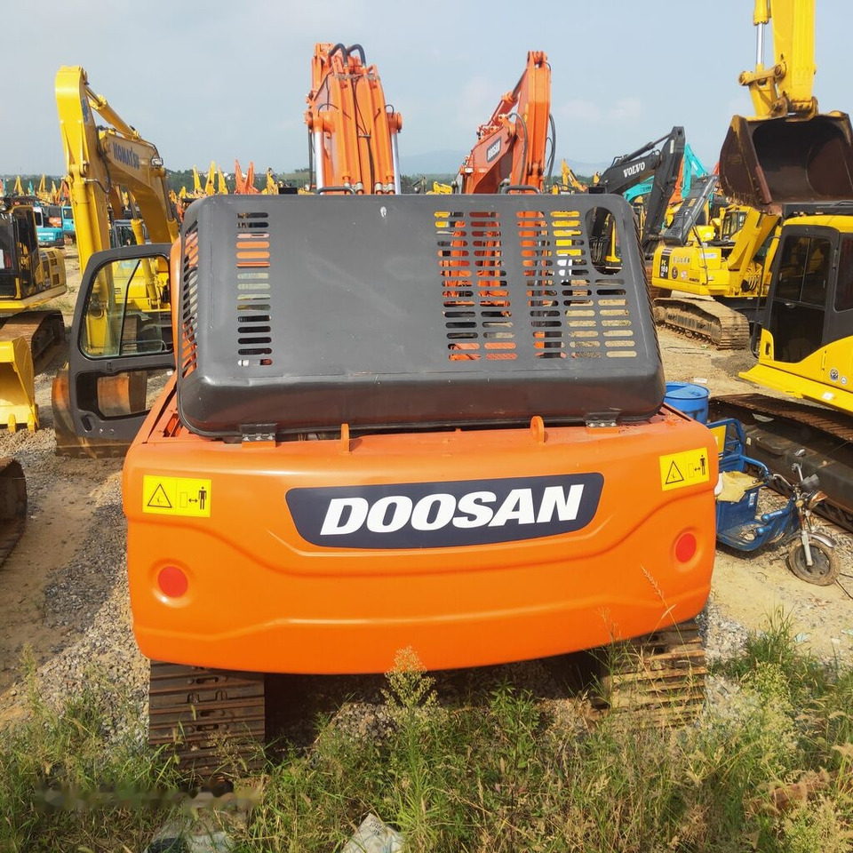 Lánctalpas kotró Doosan DX300LC: 6 kép.