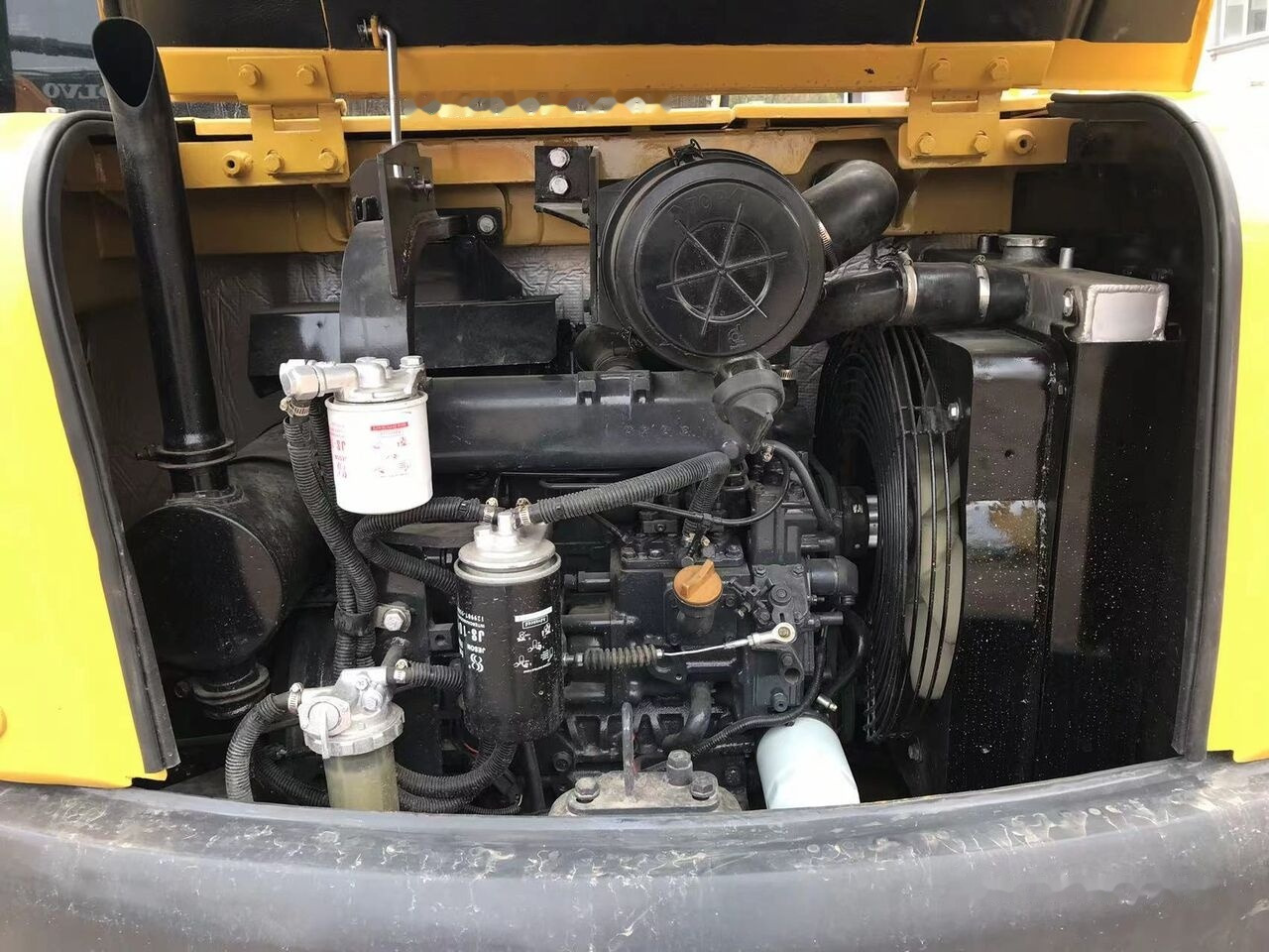 Minikotró Komatsu PC56: 11 kép.