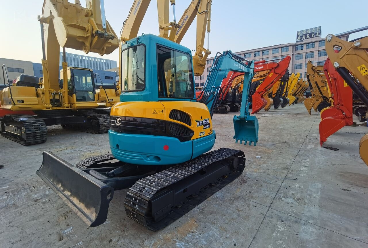 Kubota KX155 - Minikotró: 2 kép. Kubota KX155 - Minikotró: 2 kép.