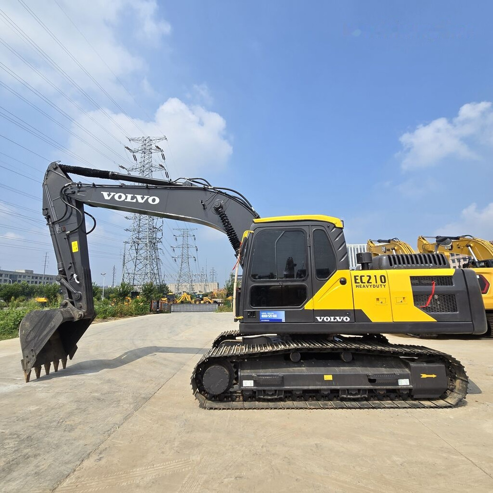 Volvo EC210D - Lánctalpas kotró: 1 kép. Volvo EC210D - Lánctalpas kotró: 1 kép.