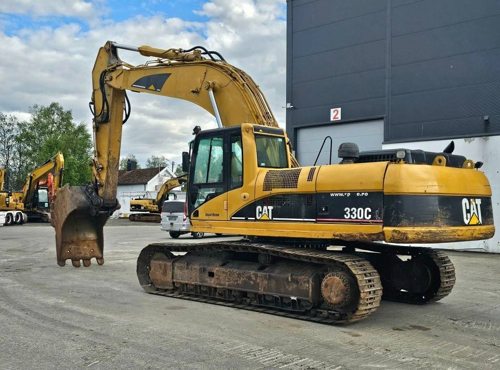 CAT 330 CL - Lánctalpas kotró: 3 kép. CAT 330 CL - Lánctalpas kotró: 3 kép.