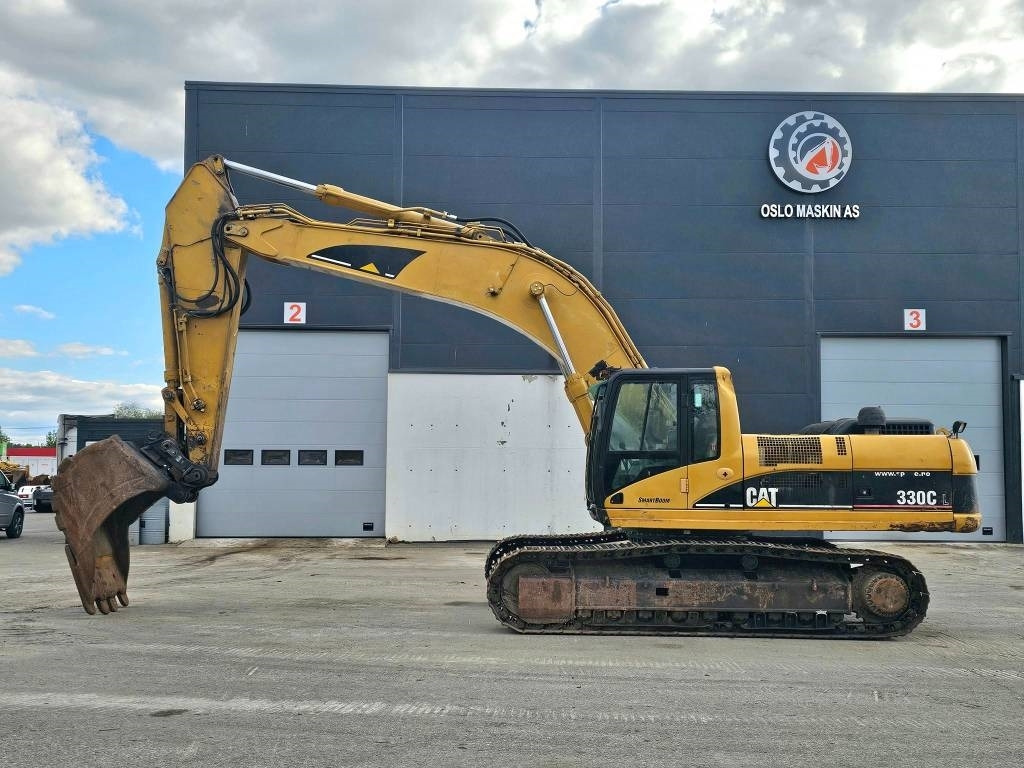 CAT 330 CL - Lánctalpas kotró: 2 kép. CAT 330 CL - Lánctalpas kotró: 2 kép.