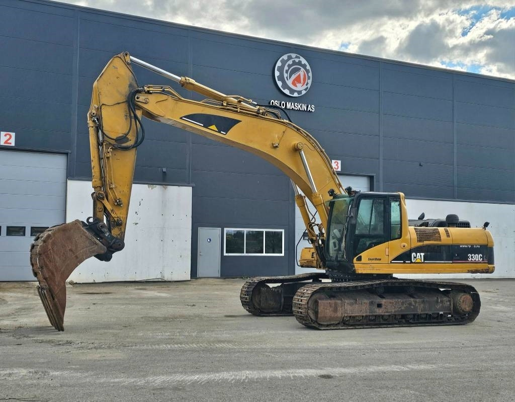 CAT 330 CL - Lánctalpas kotró: 1 kép. CAT 330 CL - Lánctalpas kotró: 1 kép.