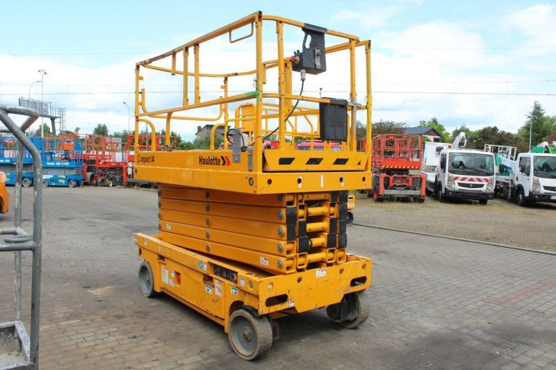 Podnośnik nożycowy elektryczny 14 m Haulotte Compact 14 - Ollós emelő: 2 kép. Podnośnik nożycowy elektryczny 14 m Haulotte Compact 14 - Ollós emelő: 2 kép.