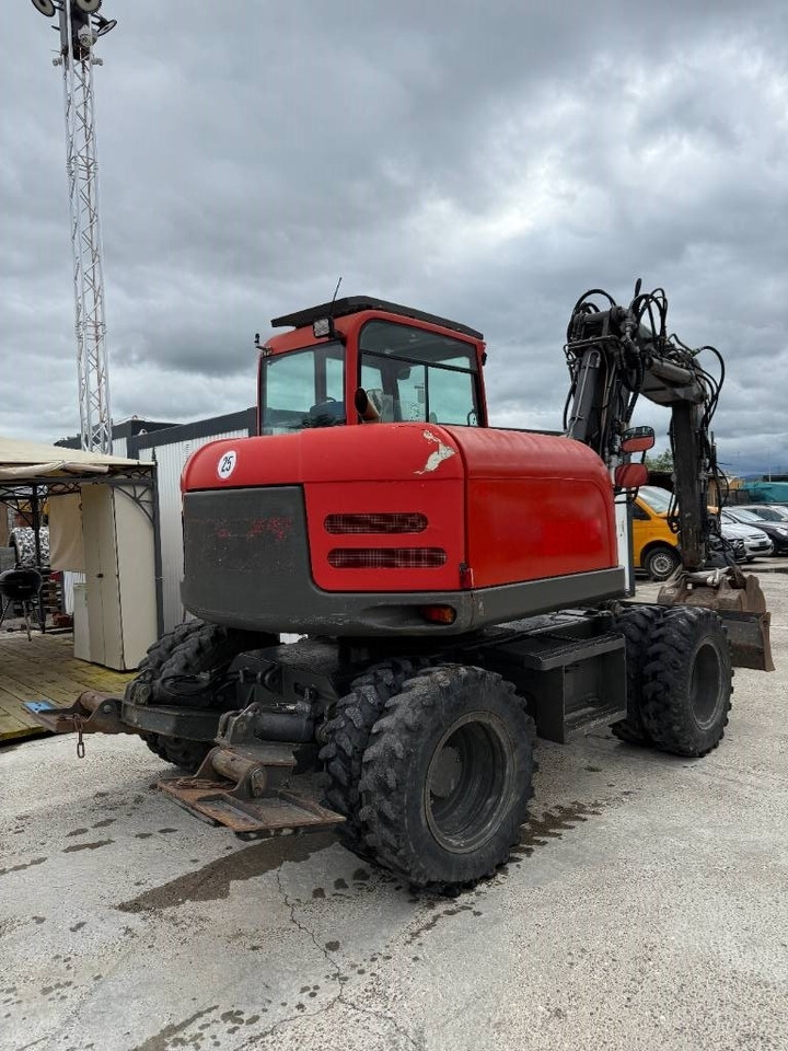 Terex TW 85 - Gumikerekes kotró: 2 kép. Terex TW 85 - Gumikerekes kotró: 2 kép.