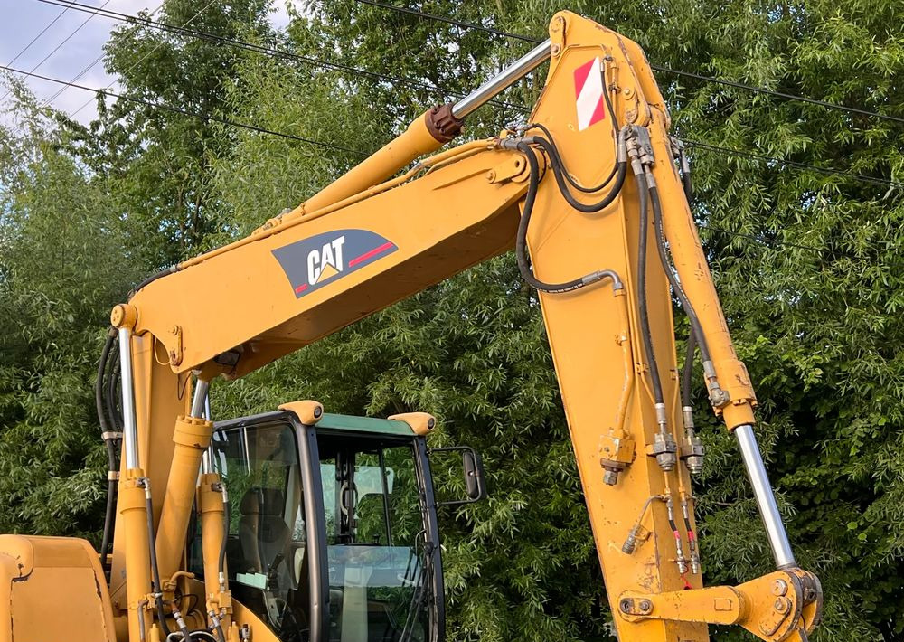 Caterpillar CAT M315C CATERPILLAR SPROWADZONY Bardzo Dobry Stan - Gumikerekes kotró: 4 kép. Caterpillar CAT M315C CATERPILLAR SPROWADZONY Bardzo Dobry Stan - Gumikerekes kotró: 4 kép.