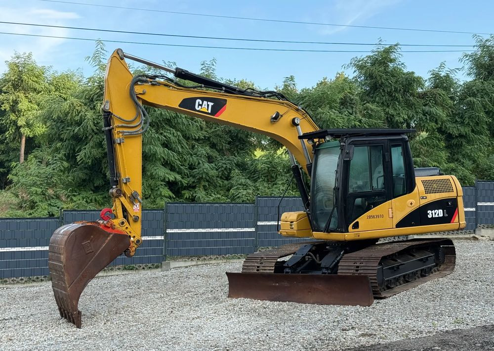 Caterpillar * Koparka CAT 312 D L * Szybkozłącze * Bardzo Dobry Stan * Caterpillar - Lánctalpas kotró: 1 kép. Caterpillar * Koparka CAT 312 D L * Szybkozłącze * Bardzo Dobry Stan * Caterpillar - Lánctalpas kotró: 1 kép.