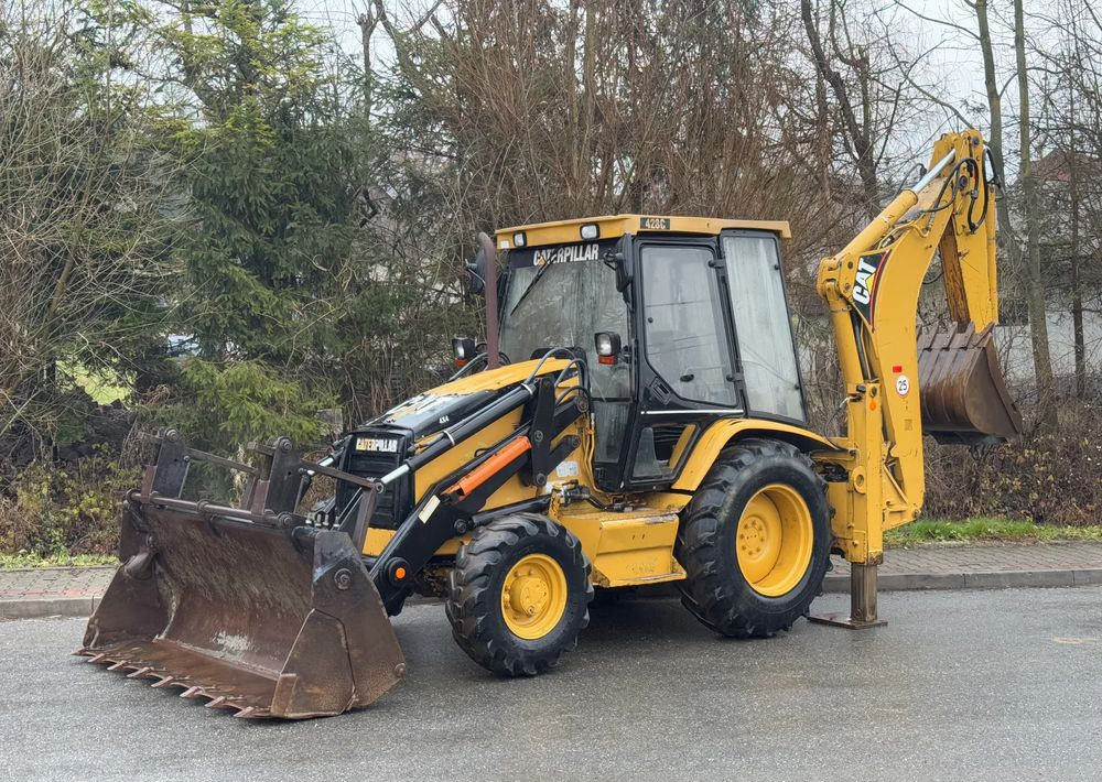 Caterpillar * Koparko Ładowarka * CAT 428 c * Caterpillar * Stan Dobry - Kotrórakodó: 1 kép. Caterpillar * Koparko Ładowarka * CAT 428 c * Caterpillar * Stan Dobry - Kotrórakodó: 1 kép.