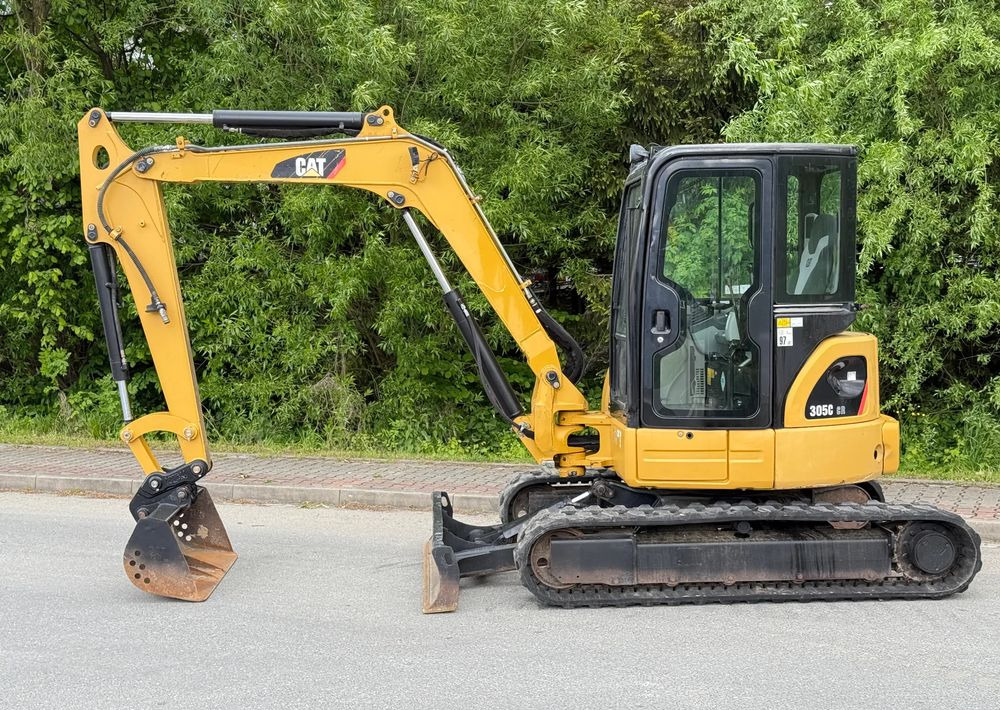 Caterpillar Minikoparka * CAT 305.5 CR * Sprowadzona ! * Bardzo Dobry Stan * Minikoparka - Lánctalpas kotró: 4 kép. Caterpillar Minikoparka * CAT 305.5 CR * Sprowadzona ! * Bardzo Dobry Stan * Minikoparka - Lánctalpas kotró: 4 kép.