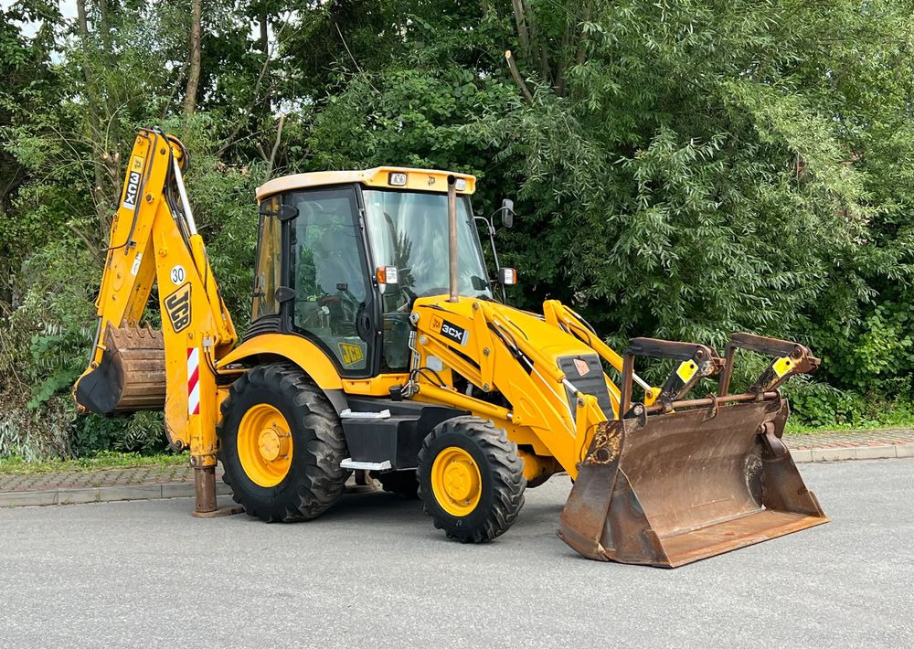 JCB KOPARKO ŁADOWARKA JCB 3CX STAN DOBRY - Kotrórakodó: 2 kép. JCB KOPARKO ŁADOWARKA JCB 3CX STAN DOBRY - Kotrórakodó: 2 kép.