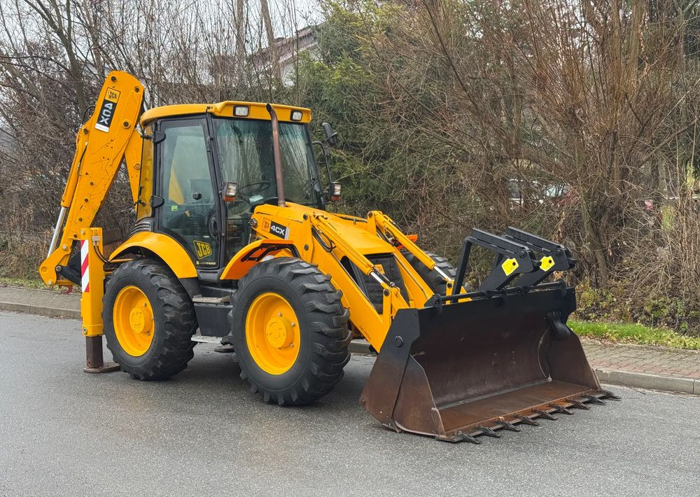 JCB * Koparko Ładowarka JCB 4CX * Joystick * TORQUELOCK * Bardzo Dobry Stan * - Kotrórakodó: 2 kép. JCB * Koparko Ładowarka JCB 4CX * Joystick * TORQUELOCK * Bardzo Dobry Stan * - Kotrórakodó: 2 kép.