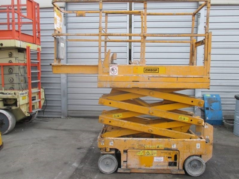Genie GS 1532 - Ollós emelő: 1 kép. Genie GS 1532 - Ollós emelő: 1 kép.