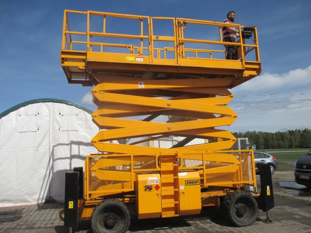 Genie GS 5390 RT - Ollós emelő: 1 kép. Genie GS 5390 RT - Ollós emelő: 1 kép.
