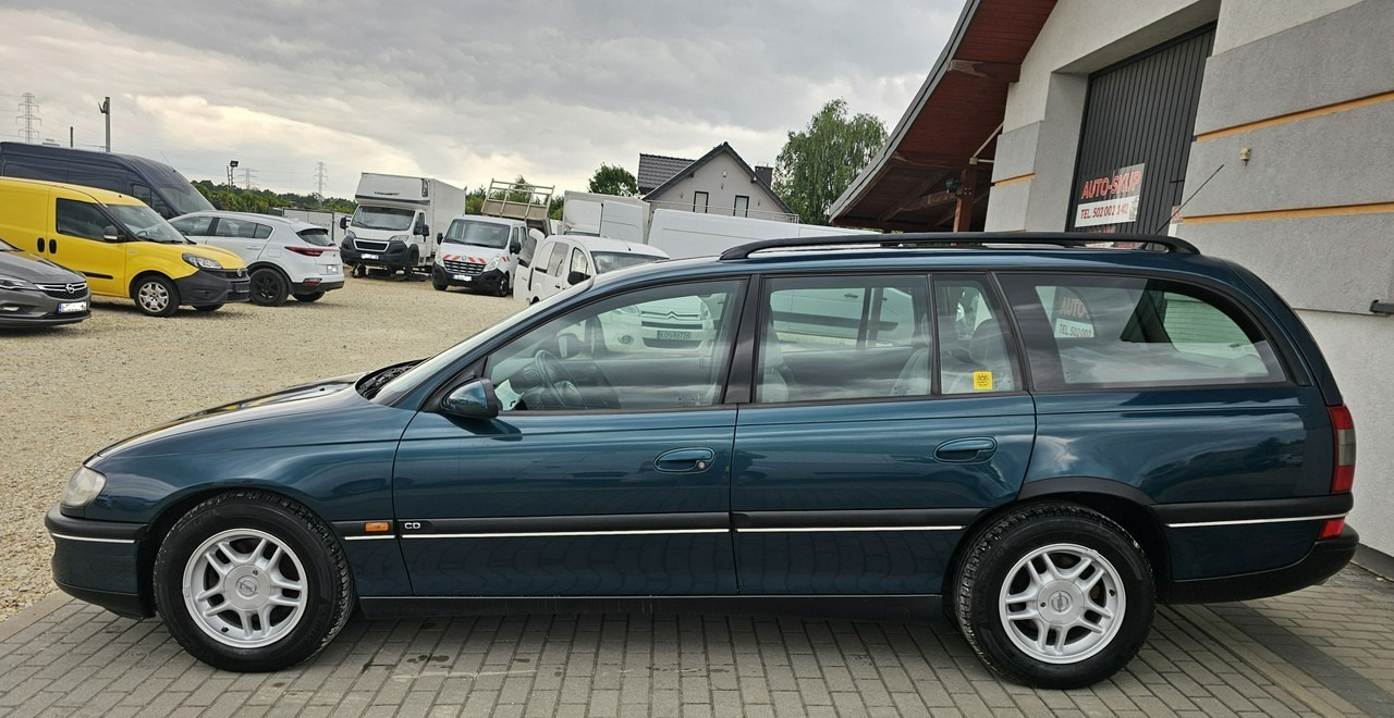 Opel Omega B 2,5 v6 *automat* napęd tył *welury* - Autó: 4 kép. Opel Omega B 2,5 v6 *automat* napęd tył *welury* - Autó: 4 kép.