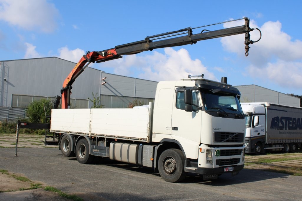 Volvo Volvo FH 13 400 62R PALFINGER PK 11502 EURO 5 - Platós teherautó, Darus autó: 3 kép. Volvo Volvo FH 13 400 62R PALFINGER PK 11502 EURO 5 - Platós teherautó, Darus autó: 3 kép.