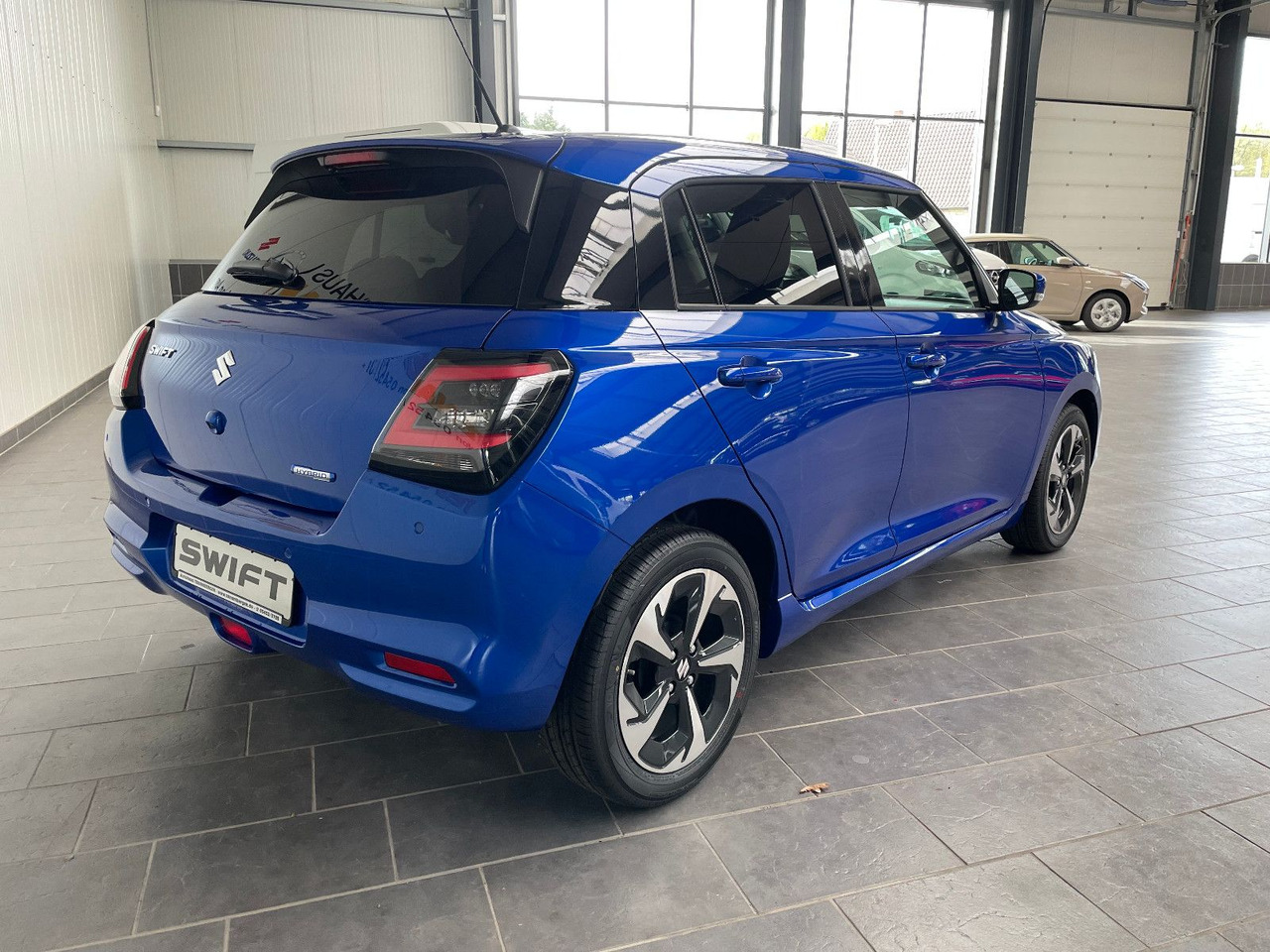 Suzuki Swift 1.2 DUALJET HYBRID Comfort+ - Autó: 3 kép. Suzuki Swift 1.2 DUALJET HYBRID Comfort+ - Autó: 3 kép.
