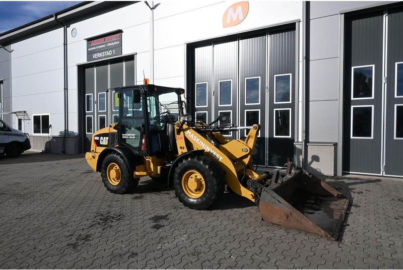 Caterpillar 906 H2 - Gumikerekes homlokrakodó: 5 kép. Caterpillar 906 H2 - Gumikerekes homlokrakodó: 5 kép.