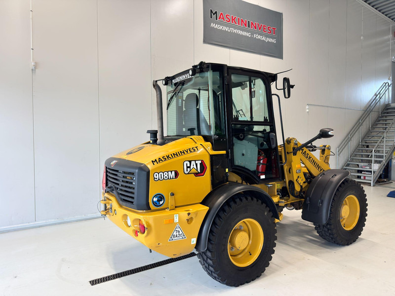 Gumikerekes homlokrakodó Caterpillar 908 Cat 908 M: 6 kép.