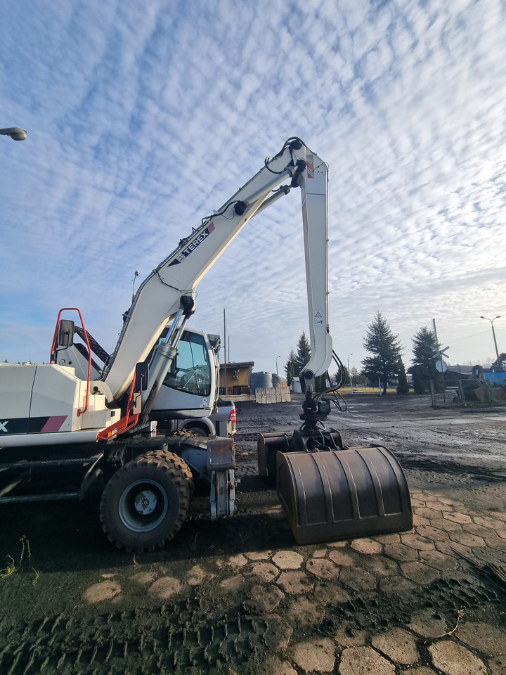 Terex TM 230 - Hulladék kotró: 1 kép. Terex TM 230 - Hulladék kotró: 1 kép.
