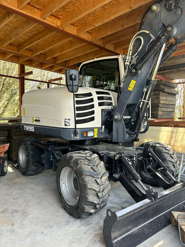 SCHAEFF TW95 - Gumikerekes kotró: 1 kép. SCHAEFF TW95 - Gumikerekes kotró: 1 kép.