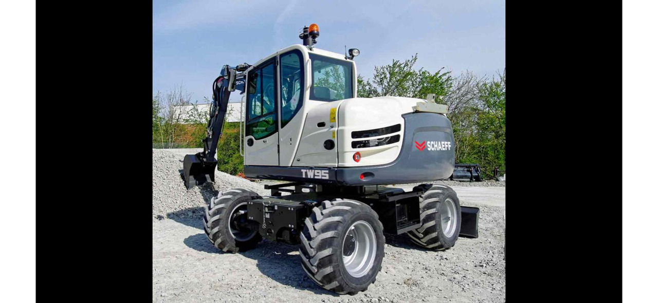 SCHAEFF TW95 - Gumikerekes kotró: 4 kép. SCHAEFF TW95 - Gumikerekes kotró: 4 kép.