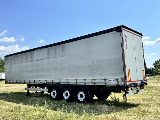Schmitz SCS BS/Curtainsider S3T - Ponyvás félpótkocsi: 1 kép. Schmitz SCS BS/Curtainsider S3T - Ponyvás félpótkocsi: 1 kép.