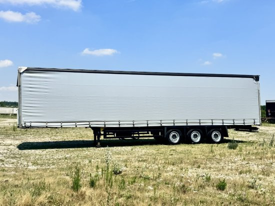 Schmitz SCS BS/Curtainsider S3T - Ponyvás félpótkocsi: 1 kép. Schmitz SCS BS/Curtainsider S3T - Ponyvás félpótkocsi: 1 kép.