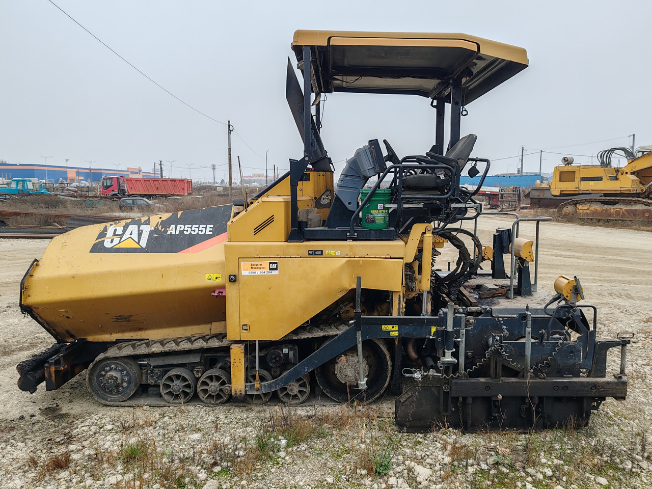 Caterpillar AP555E - Bitumenszóró: 4 kép. Caterpillar AP555E - Bitumenszóró: 4 kép.
