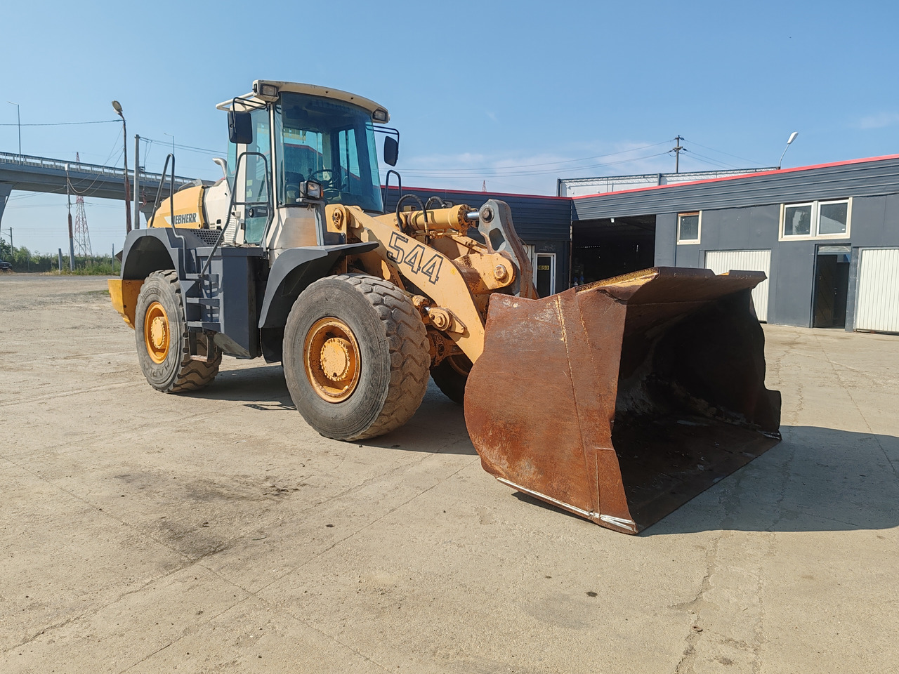 Liebherr 544 Incarcator Frontal Vola - Gumikerekes homlokrakodó: 1 kép. Liebherr 544 Incarcator Frontal Vola - Gumikerekes homlokrakodó: 1 kép.