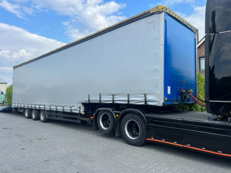 Kögel Semi dieplader met oprijklep - Félpótkocsi mélybölcsős: 5 kép. Kögel Semi dieplader met oprijklep - Félpótkocsi mélybölcsős: 5 kép.