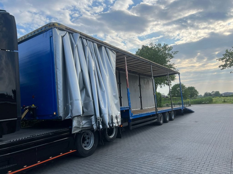 Kögel Semi dieplader met oprijklep - Félpótkocsi mélybölcsős: 2 kép. Kögel Semi dieplader met oprijklep - Félpótkocsi mélybölcsős: 2 kép.
