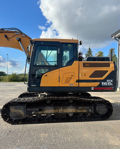 HyundaiHX160L + Engcon - Lánctalpas kotró: 2 kép. HyundaiHX160L + Engcon - Lánctalpas kotró: 2 kép.
