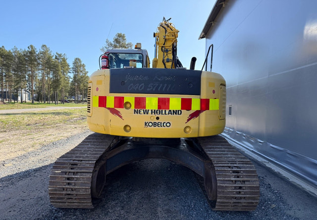 New HollandE235SR - Lánctalpas kotró: 4 kép. New HollandE235SR - Lánctalpas kotró: 4 kép.