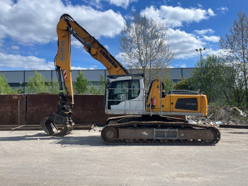 Liebherr LH 30 C Litronic - Hulladék kotró: 1 kép. Liebherr LH 30 C Litronic - Hulladék kotró: 1 kép.