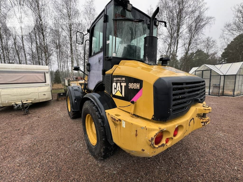 CAT 908 H - Gumikerekes homlokrakodó: 4 kép. CAT 908 H - Gumikerekes homlokrakodó: 4 kép.