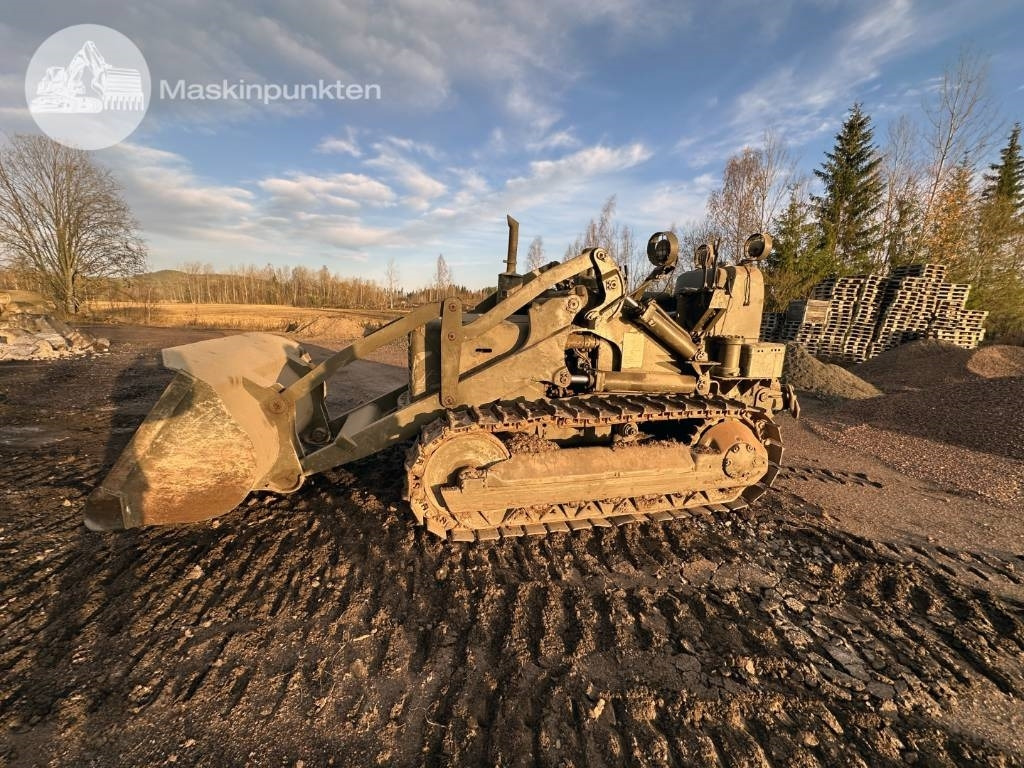 CAT 955 - Lánctalpas homlokrakodó: 4 kép. CAT 955 - Lánctalpas homlokrakodó: 4 kép.