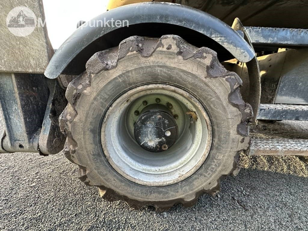 Gumikerekes kotró CAT M 317: 42 kép.